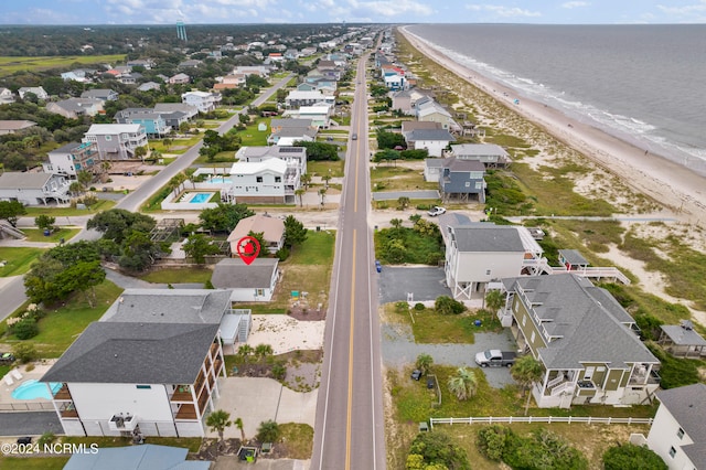 bird's eye view with a view of the beach and a water view