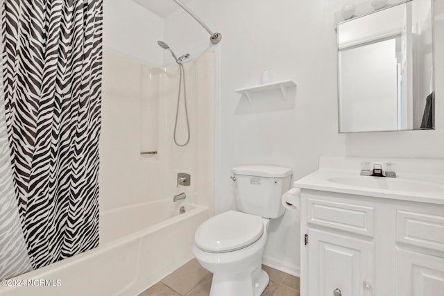 full bathroom with tile patterned flooring, vanity, toilet, and shower / bath combo with shower curtain