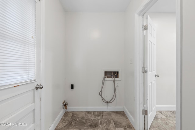 washroom with hookup for an electric dryer and hookup for a washing machine