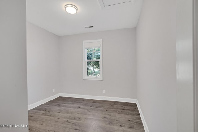 spare room featuring hardwood / wood-style flooring