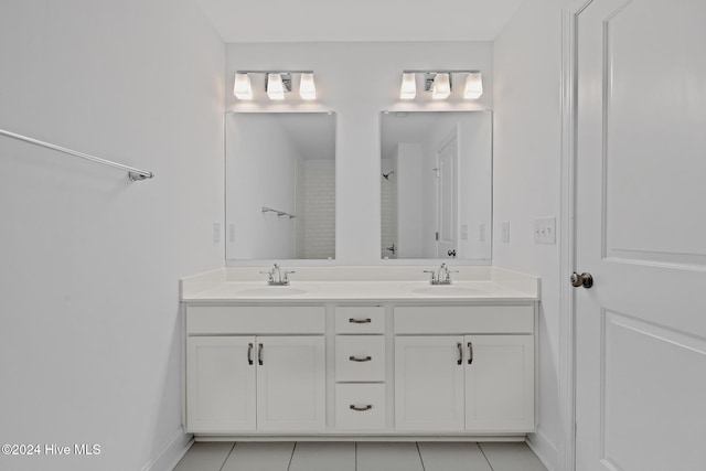 bathroom with vanity and tile patterned floors