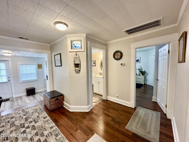 1118 W Main St, Belhaven, NC 27810 - corridor featuring wood finished floors, crown molding, and baseboards