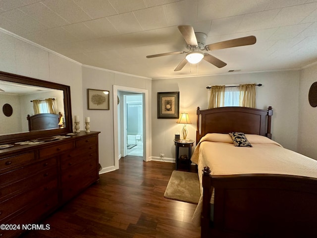 bedroom with ornamental molding, ceiling fan, and dark wood-type flooring