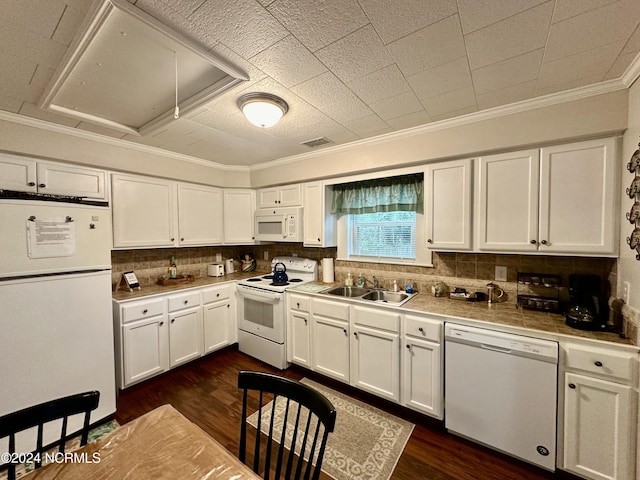 1118 W Main St, Belhaven, NC 27810 - kitchen with white appliances, a sink, crown molding, white cabinetry, and decorative backsplash