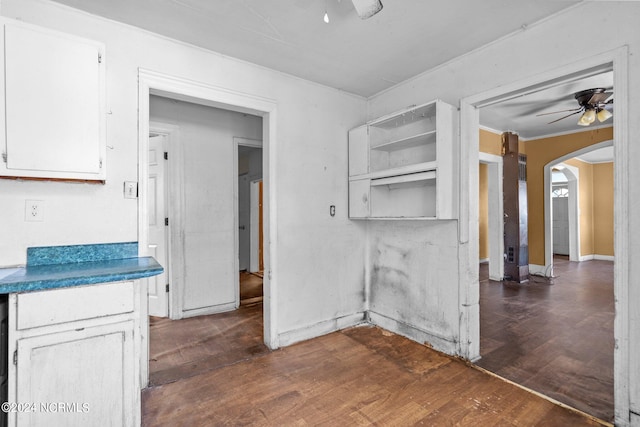 kitchen with white cabinetry, dark hardwood / wood-style floors, and ceiling fan