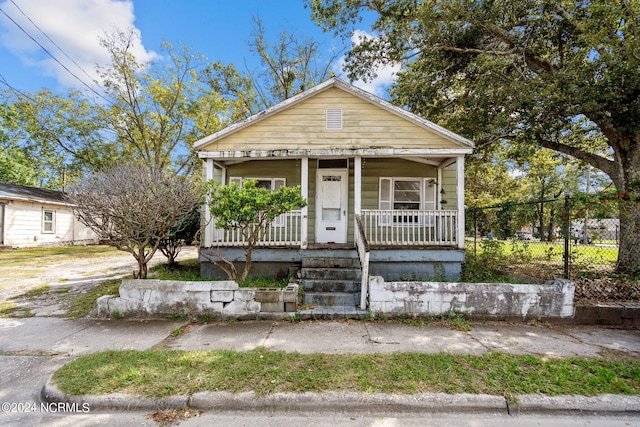 bungalow-style home with covered porch