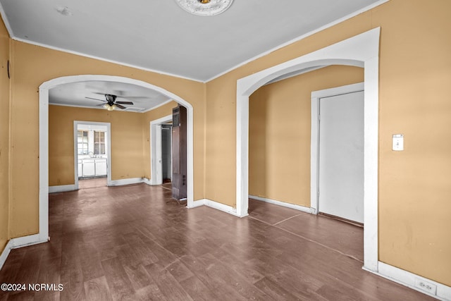 unfurnished room featuring crown molding, hardwood / wood-style floors, and ceiling fan