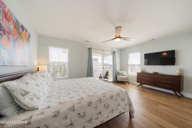 bedroom with light hardwood / wood-style floors and ceiling fan