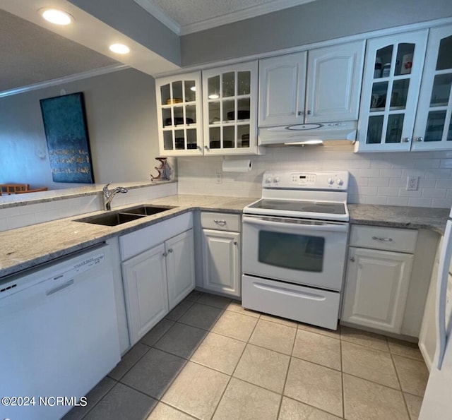 kitchen featuring dishwasher, sink, range with electric stovetop, and white cabinetry