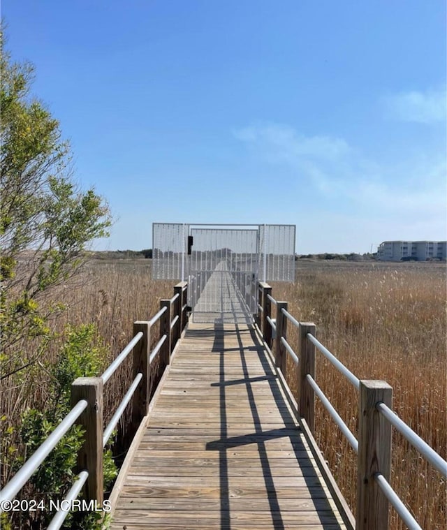 view of dock featuring a rural view