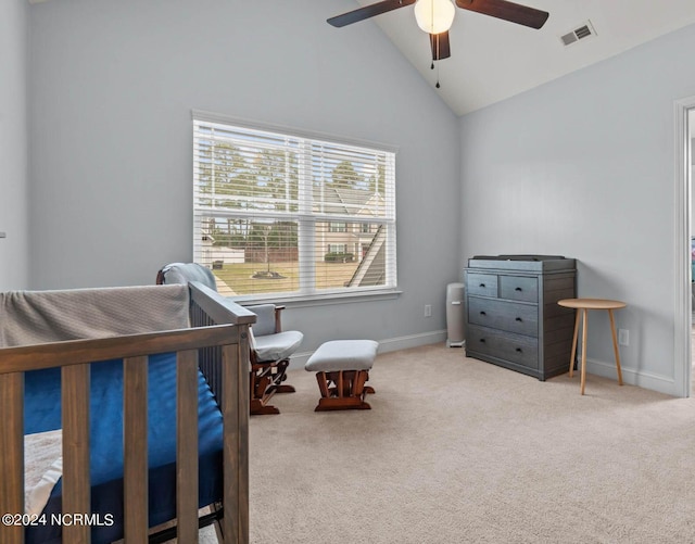 carpeted bedroom with ceiling fan and lofted ceiling