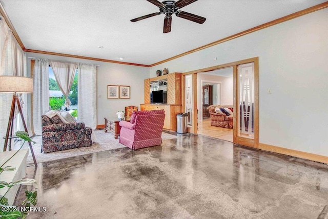 living room with a textured ceiling, crown molding, and ceiling fan