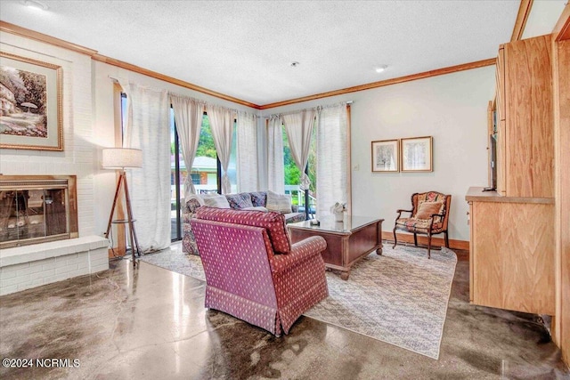 living room with a textured ceiling, a fireplace, and ornamental molding