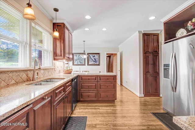 1803 Sedgefield Dr, Kinston, NC 28504 - kitchen with decorative backsplash, ornamental molding, stainless steel appliances, a sink, and light wood-type flooring