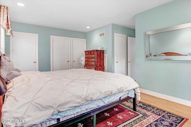 1803 Sedgefield Dr, Kinston, NC 28504 - bedroom featuring wood finished floors, recessed lighting, baseboards, and visible vents