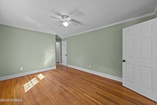 unfurnished bedroom with crown molding, light hardwood / wood-style floors, and ceiling fan