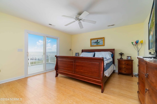 77 Indian Trl, Arapahoe, NC 28510 - bedroom with access to exterior, light wood-type flooring, a ceiling fan, and baseboards