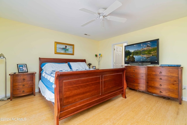 77 Indian Trl, Arapahoe, NC 28510 - bedroom featuring light wood finished floors, a ceiling fan, and baseboards