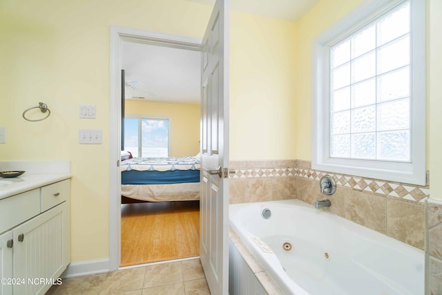 77 Indian Trl, Arapahoe, NC 28510 - full bath with ensuite bath, a whirlpool tub, vanity, and tile patterned flooring