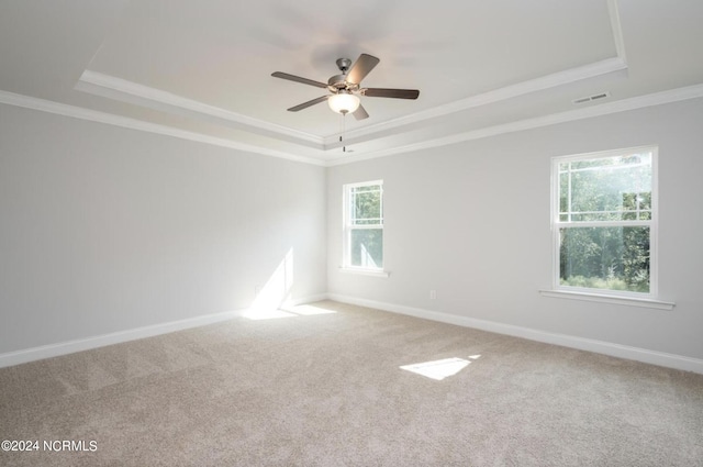 1183 Natal Dr SE, Bolivia, NC 28422 - carpeted empty room featuring a tray ceiling, crown molding, baseboards, and a ceiling fan