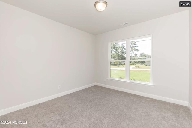 1183 Natal Dr SE, Bolivia, NC 28422 - carpeted empty room featuring visible vents and baseboards