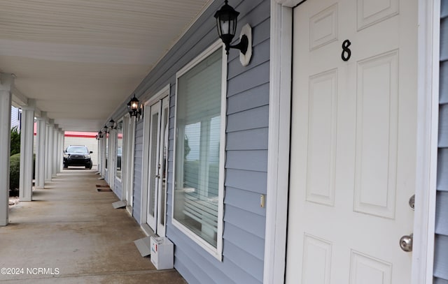 view of patio featuring a porch