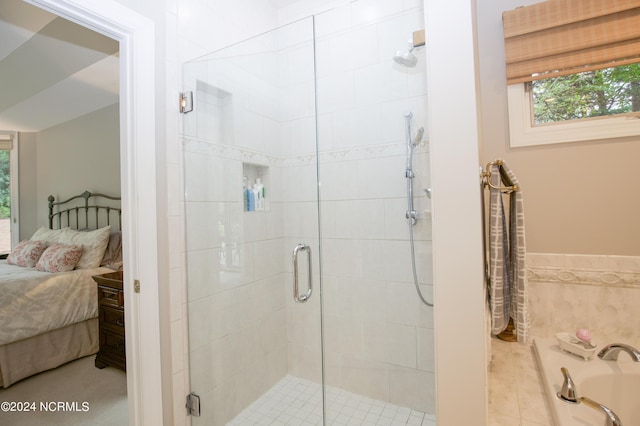 full bath featuring a stall shower and connected bathroom