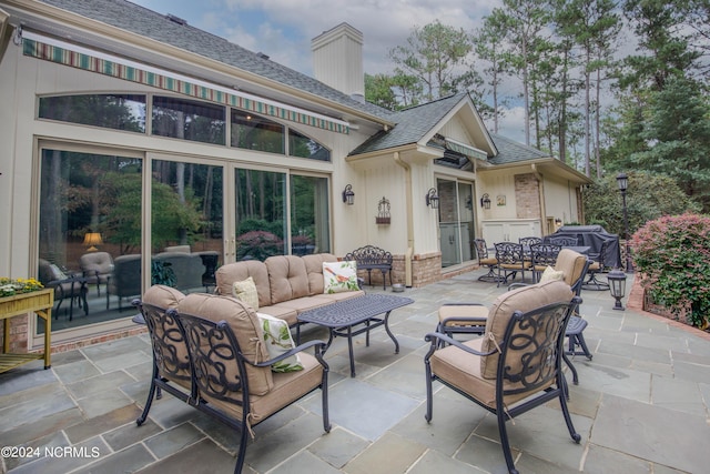 view of patio / terrace with outdoor lounge area and area for grilling