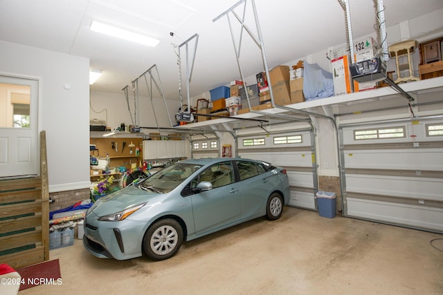 garage featuring a garage door opener