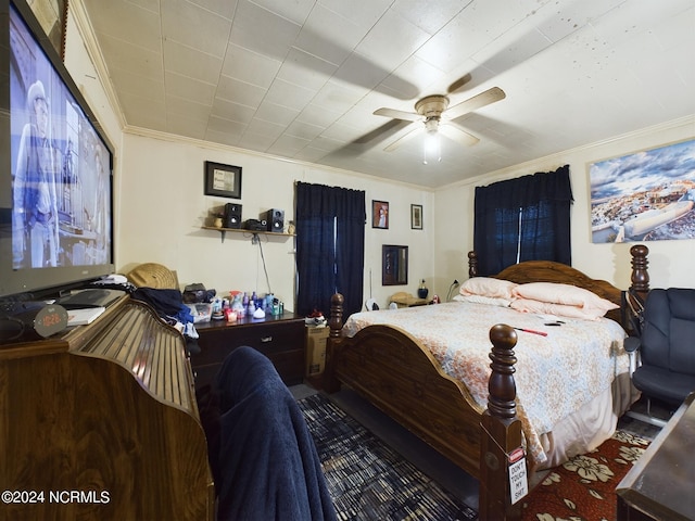 bedroom featuring ceiling fan and ornamental molding