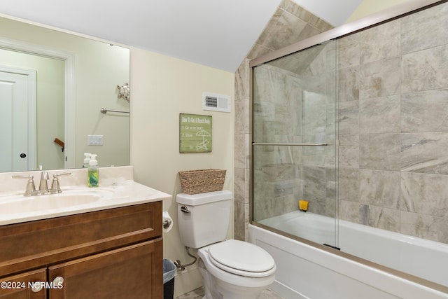 full bathroom featuring shower / bath combination with glass door, vanity, toilet, and lofted ceiling