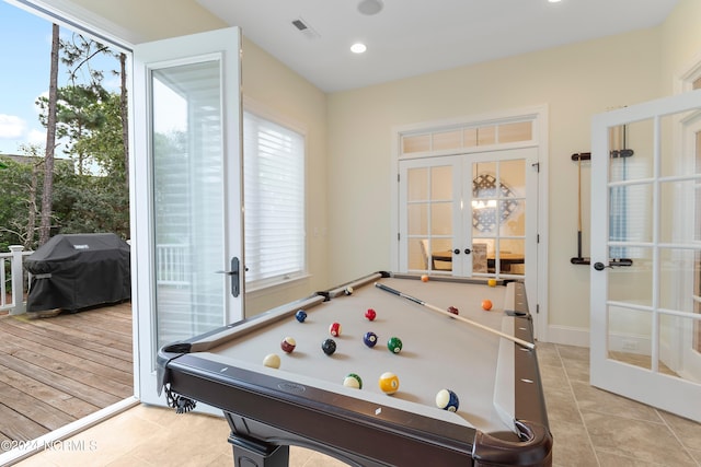 game room with french doors, light tile patterned floors, and billiards