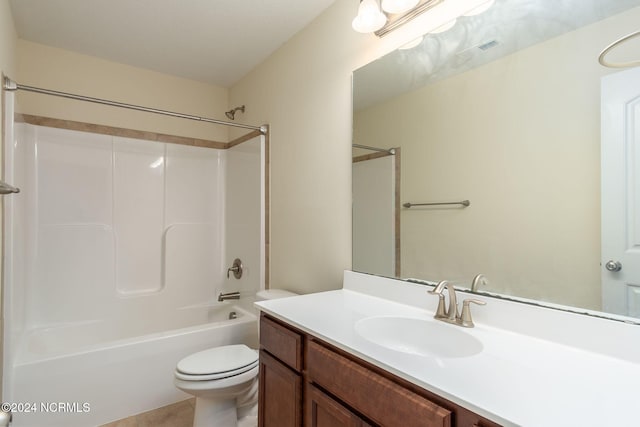 full bathroom featuring vanity, tub / shower combination, and toilet