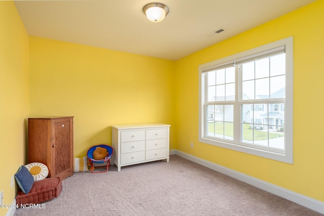 unfurnished room featuring carpet floors