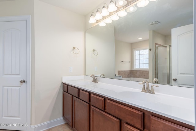 bathroom with vanity and plus walk in shower