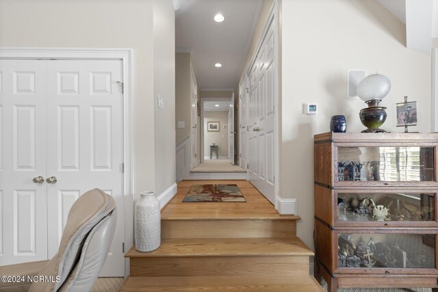 corridor with recessed lighting