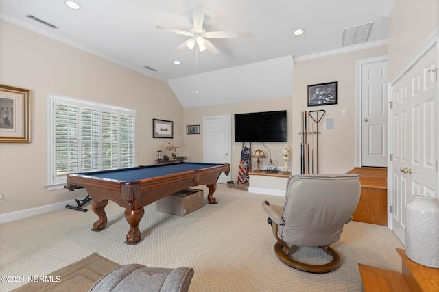 game room with ornamental molding, vaulted ceiling, light colored carpet, and ceiling fan