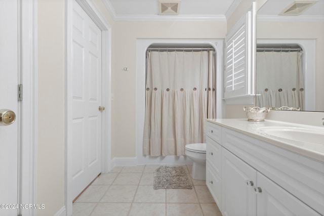 bathroom featuring ornamental molding, toilet, tile patterned flooring, and vanity