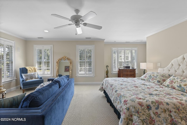 bedroom with crown molding and baseboards
