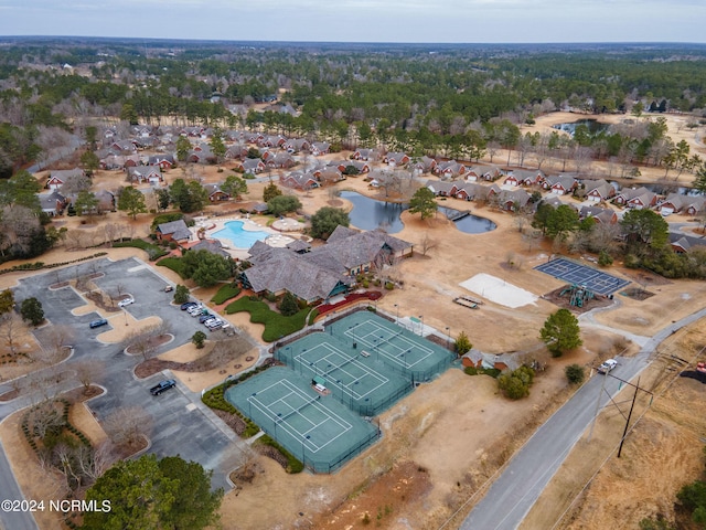 bird's eye view with a water view and a residential view