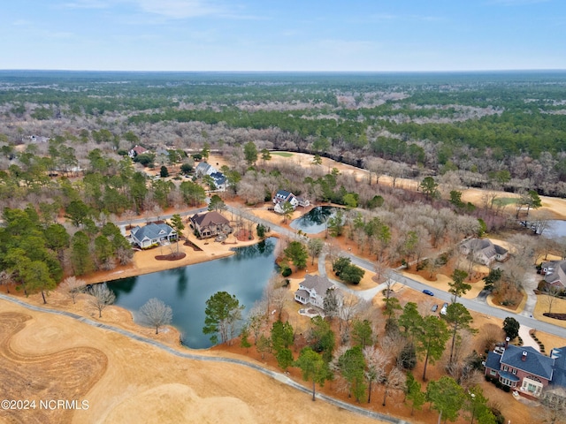 birds eye view of property with a residential view and a water view