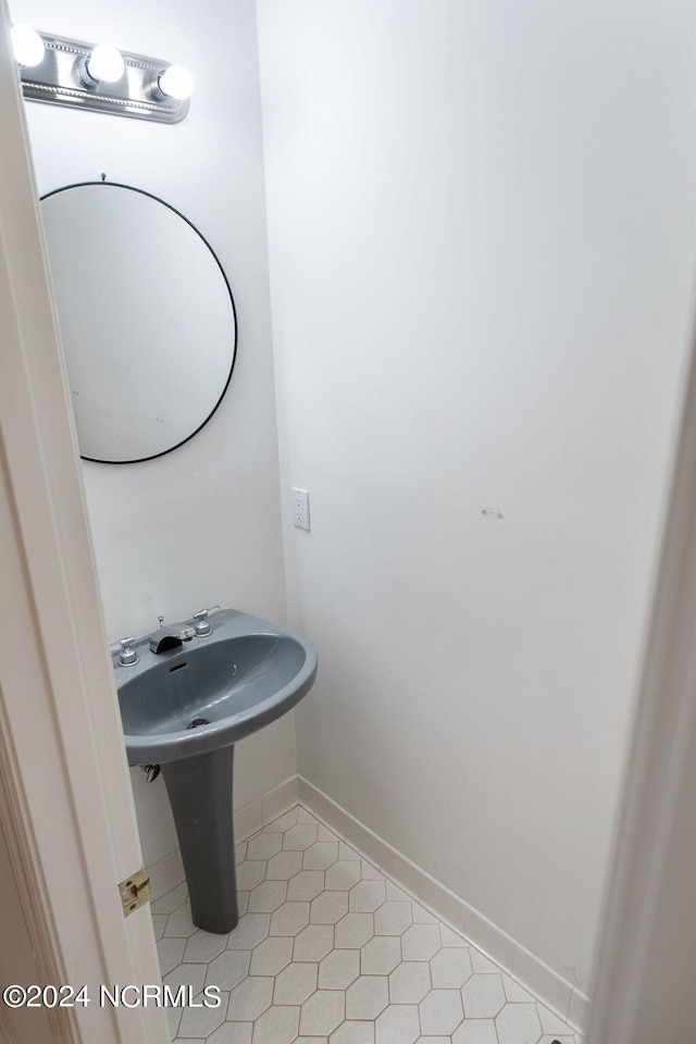 bathroom featuring tile patterned flooring