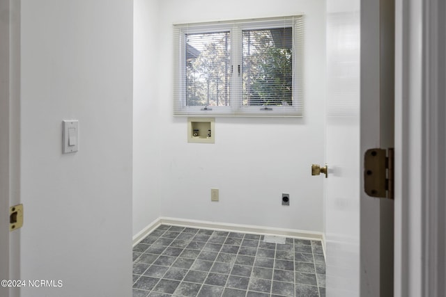 laundry area with hookup for a washing machine and hookup for an electric dryer