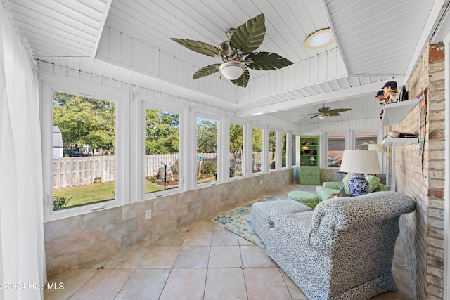 sunroom with a wealth of natural light, ceiling fan, and wooden ceiling