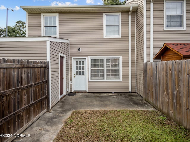 rear view of house with a patio