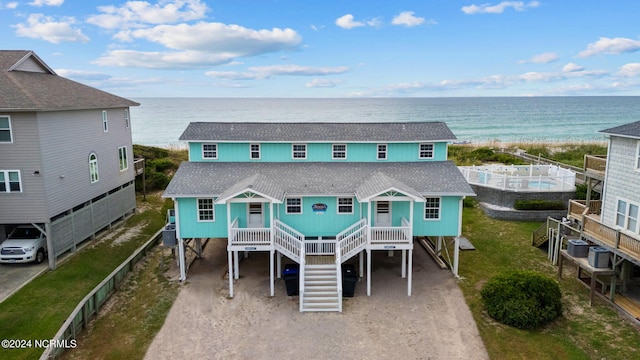 view of front of house featuring a water view