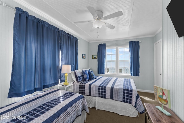 bedroom with ornamental molding, ceiling fan, and carpet floors