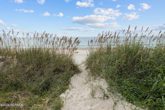 property view of water with a beach view