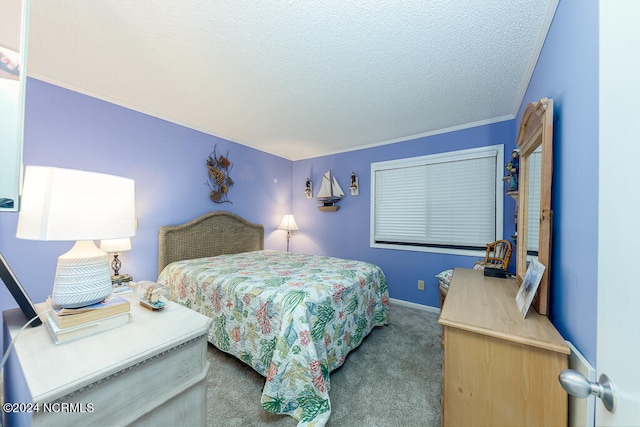 carpeted bedroom with a textured ceiling and crown molding