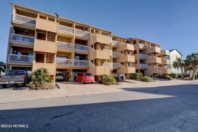 view of building exterior with a carport